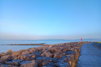 The prom in Morecambe with sea groynes visible