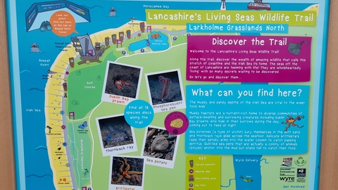 Picture shows sign showing the living seas wildlife trail