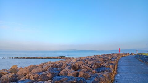 The prom in Morecambe with sea groynes visible