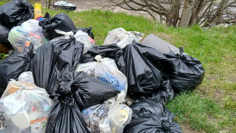A pile of bin bags at Walney Channel