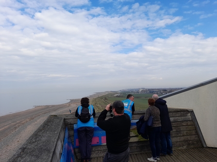 A group of people at the top of Rossall point Observation Tower