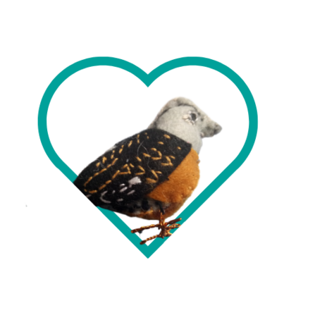 A felt brambling in a heart frame